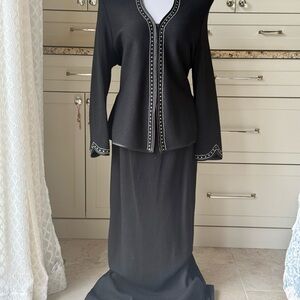 Vintage elegant two piece jacket and skirt set with rhinestone trim.